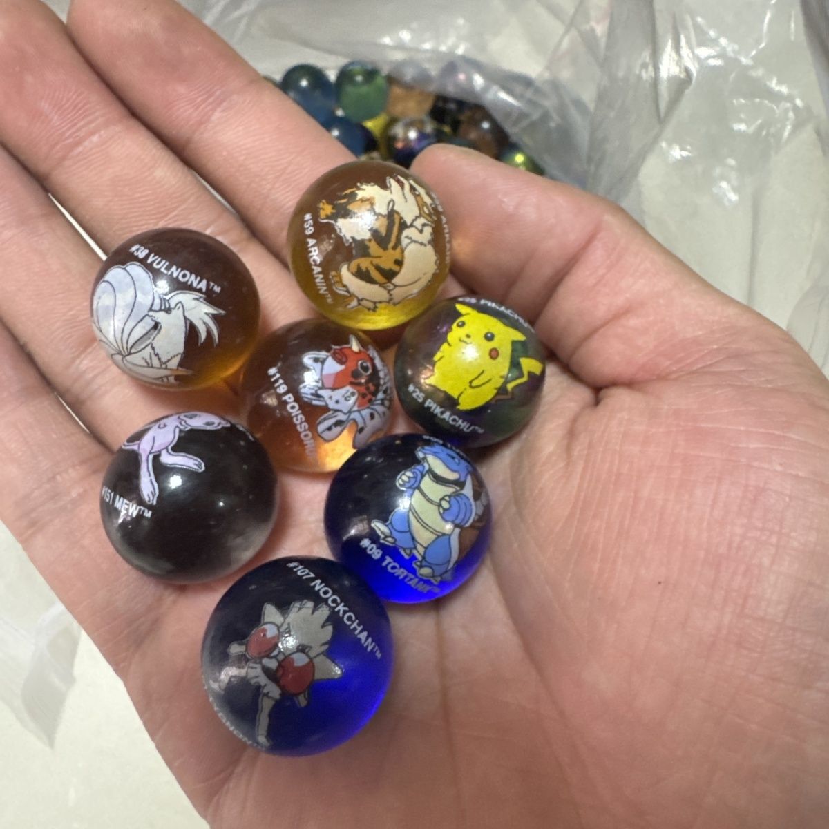 Merchandise oficial Pokémon em - Vintage Collectible Marbles avaliação e preço