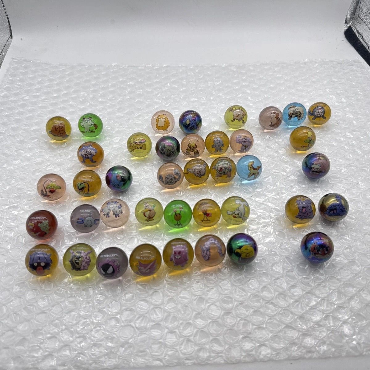 Merchandise Oficial Pokémon, B - Vintage Collectible Marbles avaliação e preço